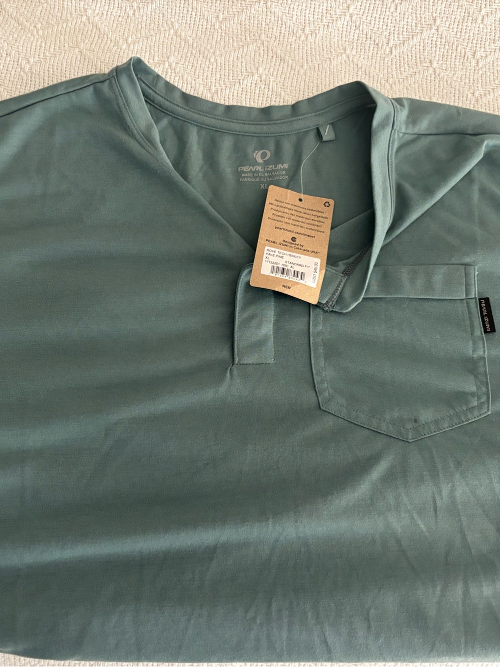 Pearl Izumi Men's Teal Pocket Short Sleeve Shirt